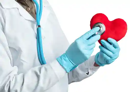 female-cardiologist-holding-red-heart
